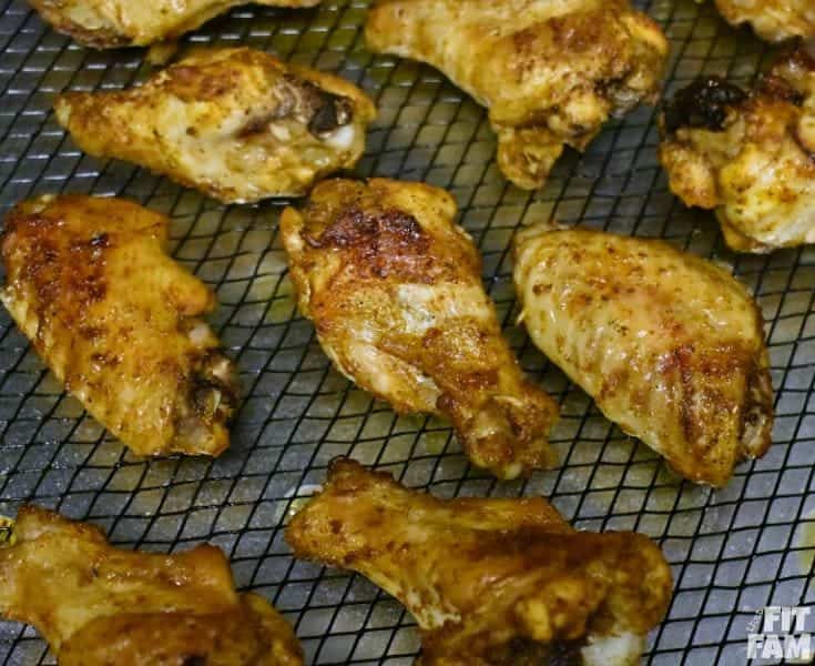 super easy crispy baked buffalo chicken wings! Crispy and just as good as fried, but so much healthier! great game day/ party food!