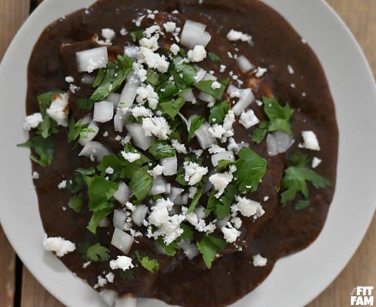 enfrijoladas is an easy authentic Mexican dish you can eat at either breakfast, lunch or dinner. It's healthy and soo good! the ultimate comfort food!