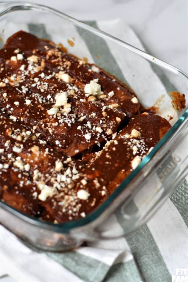 authentic red enchiladas made with a rich sauce and filled with Mexican queso fresco