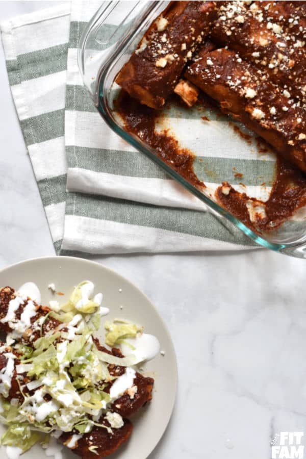 authentic red enchiladas made with a rich sauce and filled with Mexican queso fresco