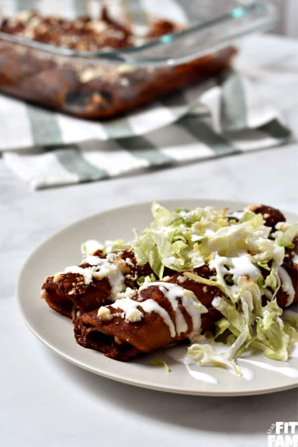 authentic red enchiladas made with a rich sauce and filled with Mexican queso fresco