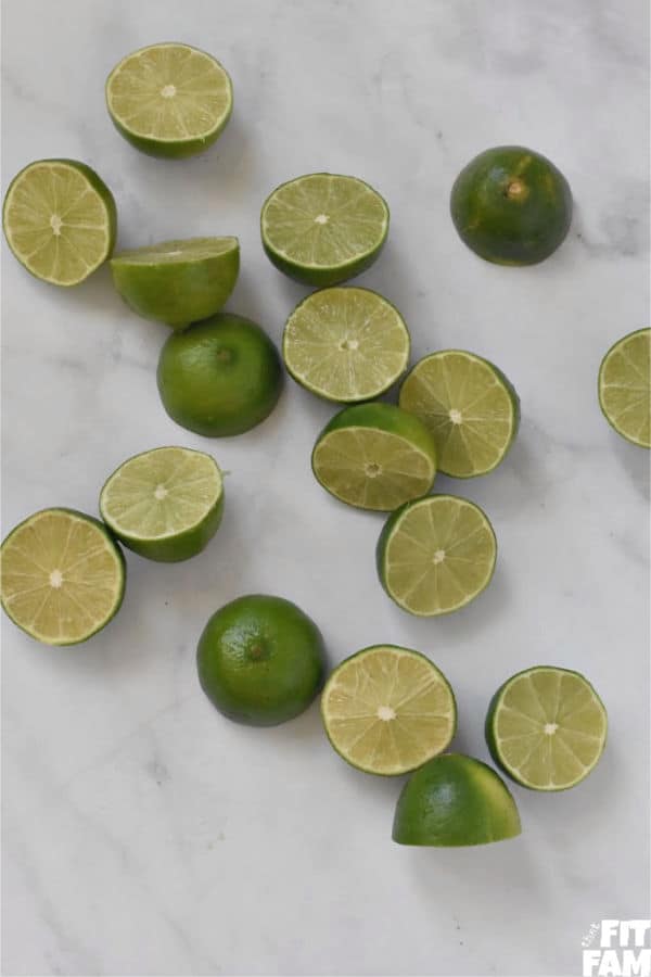 a bunch of cut up limes for making homemade limemade