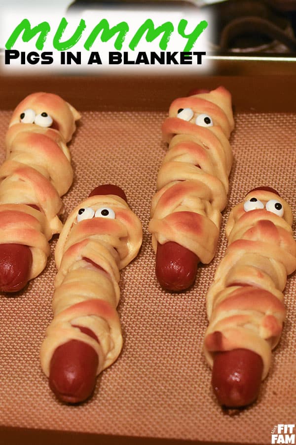 mummy pigs in a blanket are so easy and cute to make for parties during the Halloween season. #Halloweenfood