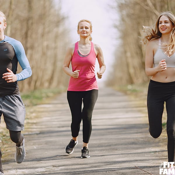 group of people jogging outside