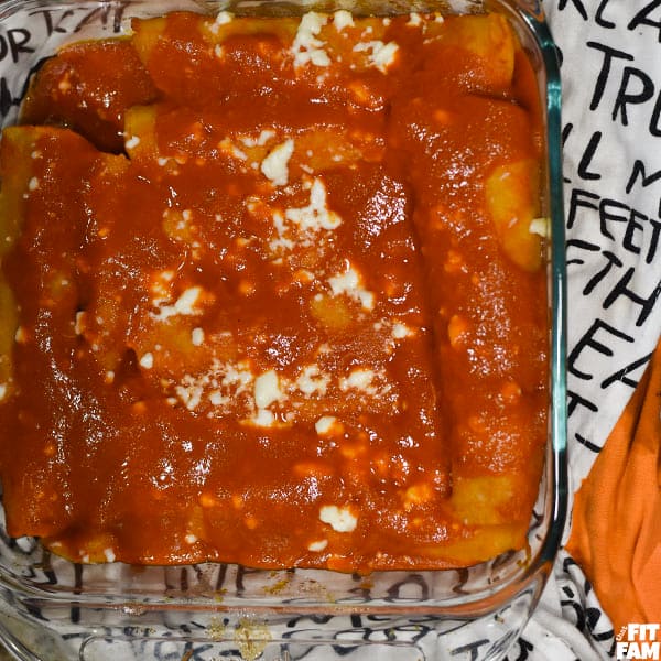 baking dish of red enchiladas