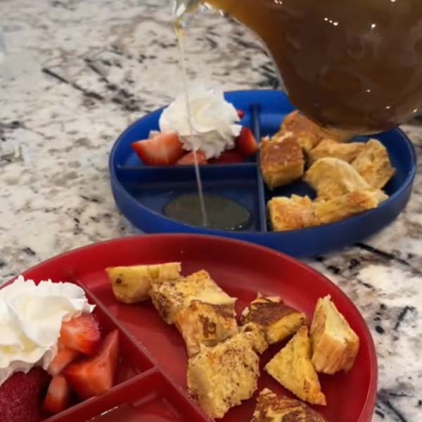 homemade French toast with strawberries and whipped cream