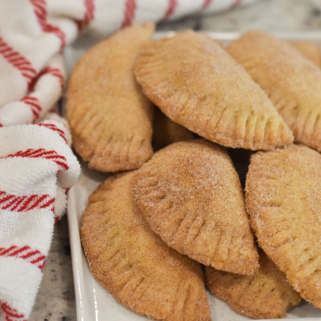 delicious sweet empanada filled with Nutella and coated in cinnamon sugar